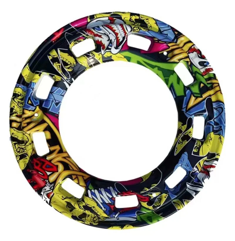 Vibrant multi-coloured wheel hubcap featuring a mosaic of bright hues in a dynamic and eye-catching pattern